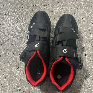 Peleton cycling shoes for Peleton bikes in black and red